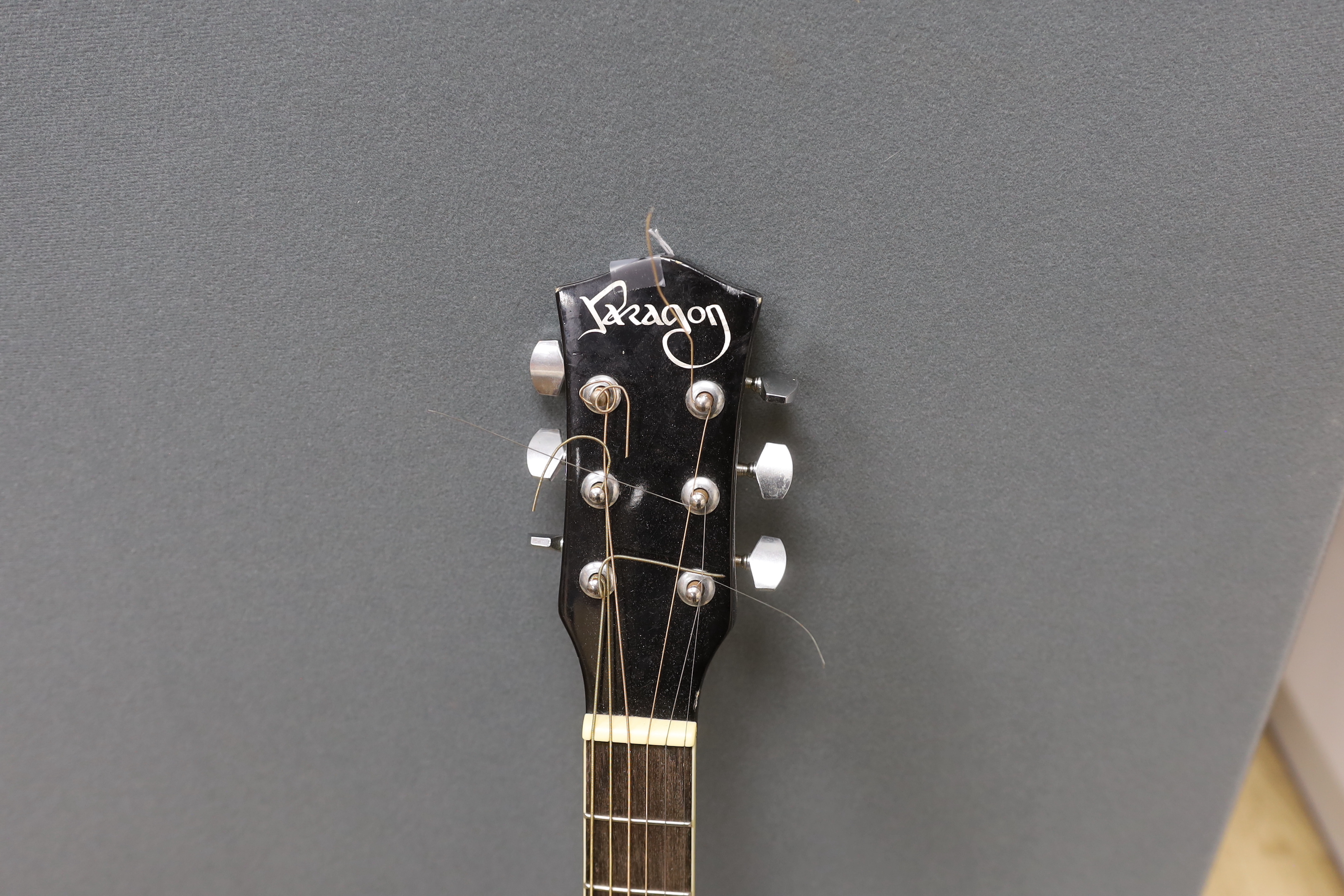 A Paragon electro-acoustic guitar